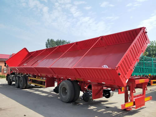 Side dump semi-trailer